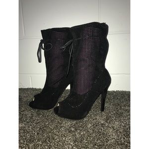Black heels, never been worn!